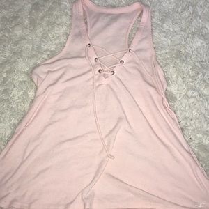 A pink tie up tank top